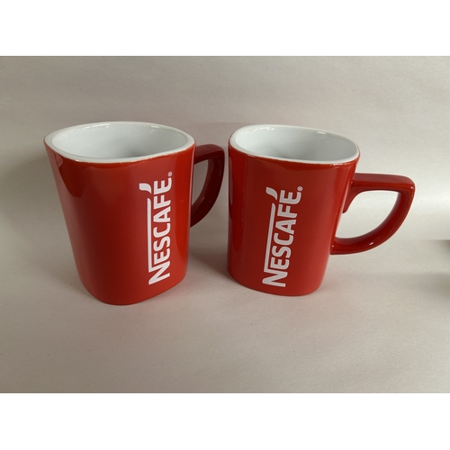 25 - 2 x New Nescafe Red Square Mugs