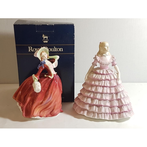 53 - Boxed Royal Doulton figure Autumn Breeze HN 1934 along with a Coalport lady