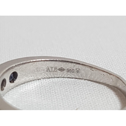 179 - Platinum set Tanzanite and diamond half hoop ring
