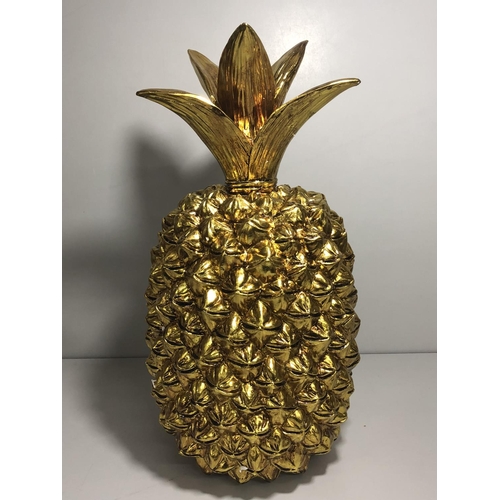 1 - Large gold coloured pineapple ornament approx 50cm tall