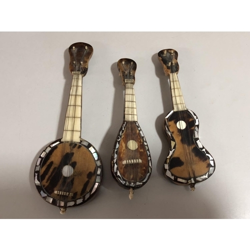 160 - 3 Tortoise shell instruments