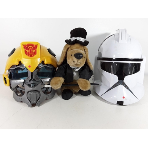 130 - 2 Novelty childs helmets & dog toy