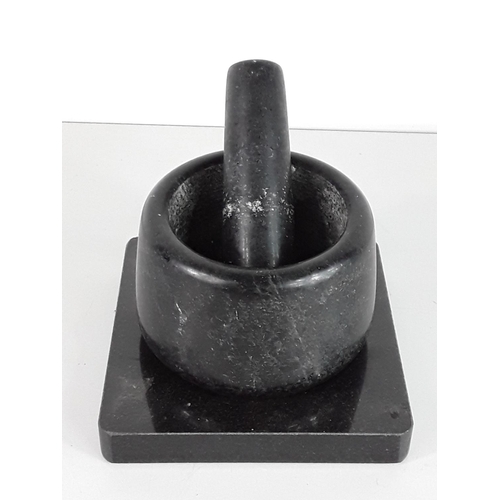 66 - Granite pestle & mortar