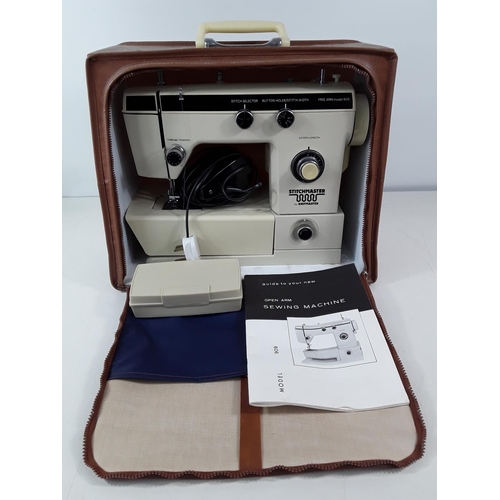 195 - Cased sewing machine