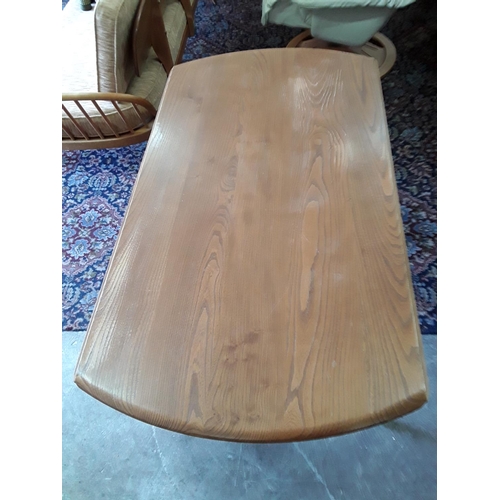 368 - Ercol mid century round drop leaf dining table