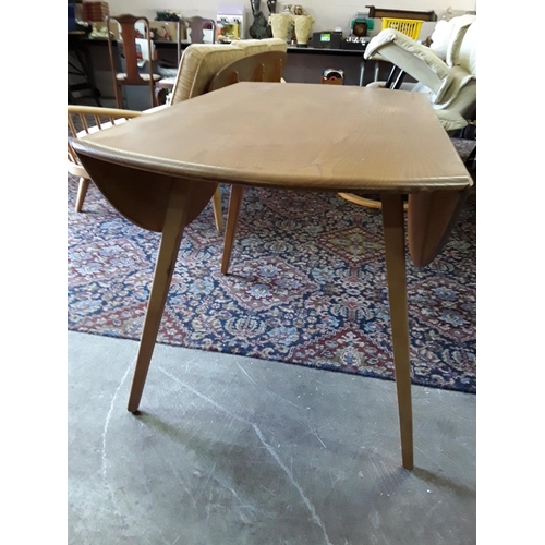 368 - Ercol mid century round drop leaf dining table