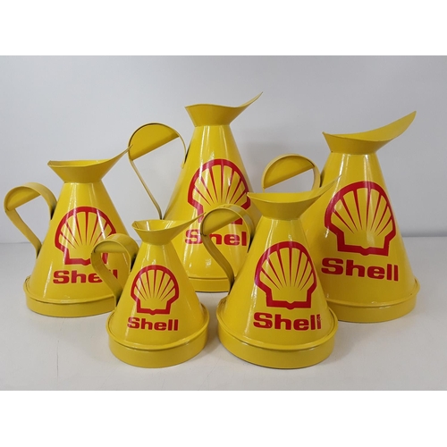 44 - Graduated set of 5 Shell oil jugs