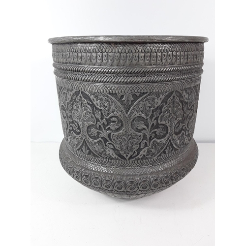 59 - Large metal eastern decorated planter approx 33cms diameter and 36cms tall