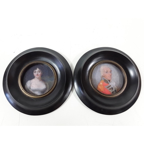 8 - Pair of round framed miniatures