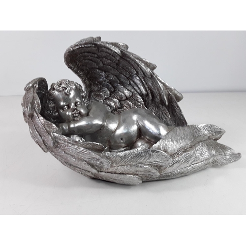 49 - Sleeping angel figure