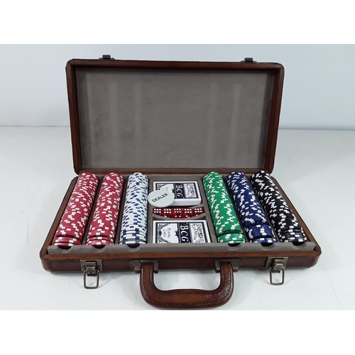 51 - Leather cased poker set