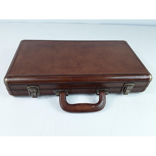 51 - Leather cased poker set