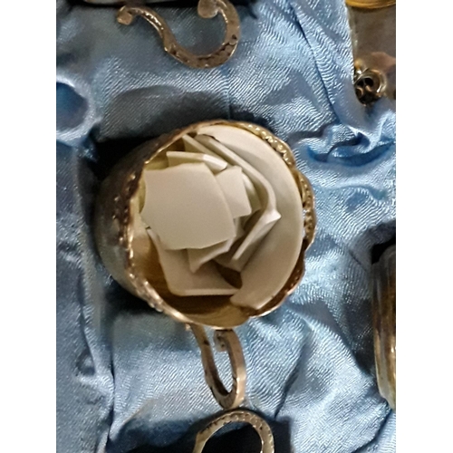 194 - Cased plated coffee set (one cup broken)