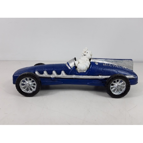 26 - Cast iron Mitchelin racing car