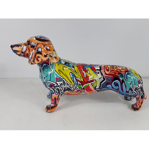 43 - Graffiti dog approx 17 inches long