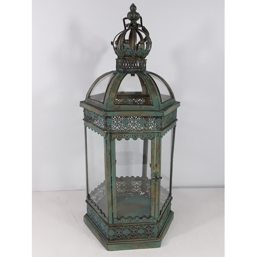 38 - Metal and glass lantern approx 24 inches tall