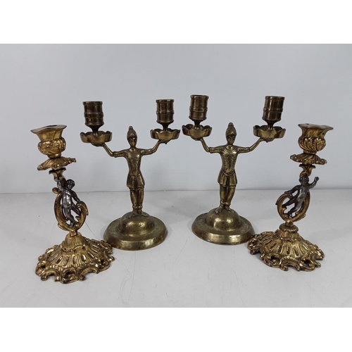 76 - 2 pairs of brass candle sticks