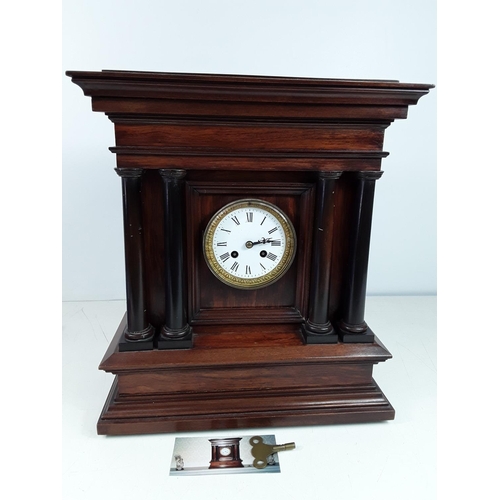 117 - Antique wooden cased mantel clock approx 17 inches tall