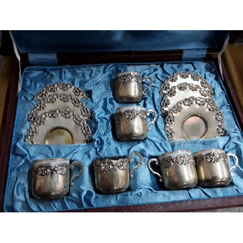 194 - Cased plated coffee set (one cup broken)