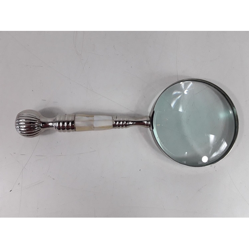 23 - Magnifying glass with mother of pearl handle