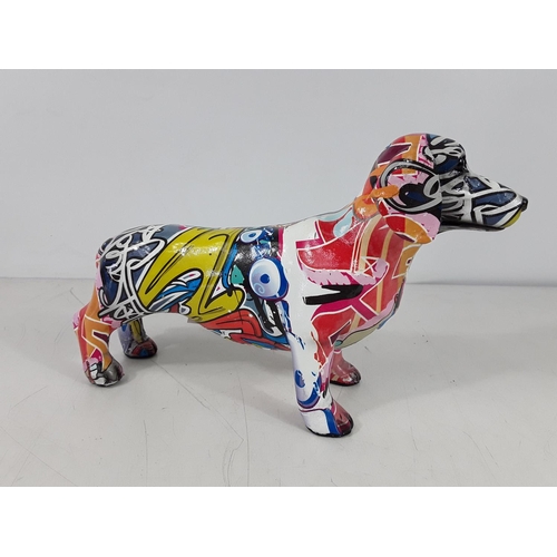 54 - Small graffiti dog figure approx 10 inches long