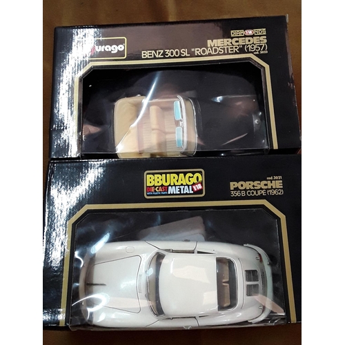 100 - 2 boxed burego model vehicles