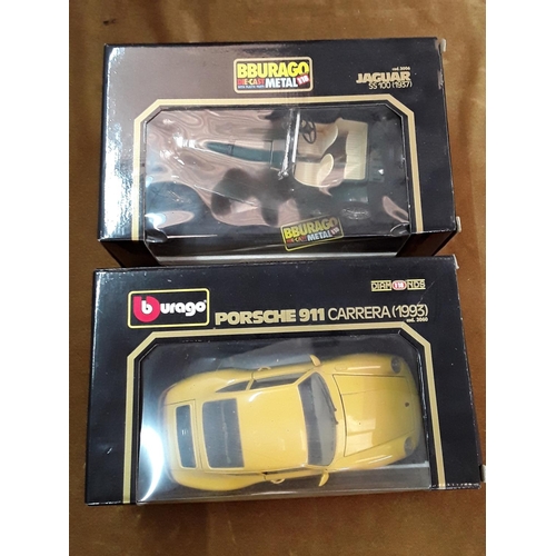 105 - 2 boxed burego model vehicles