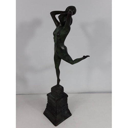 31 - Cast bronze figure of a nude dancing girl approx 17 inches tall