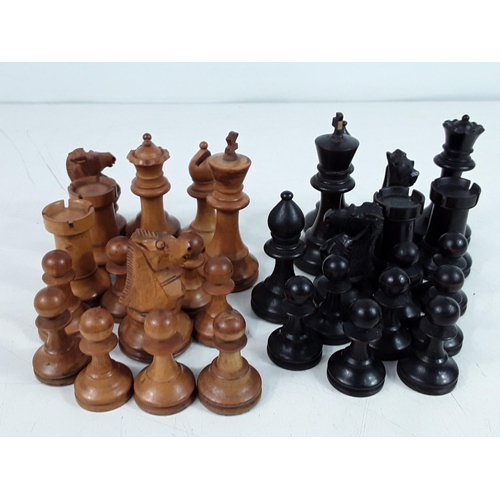 43 - Carved wooden chess pieces