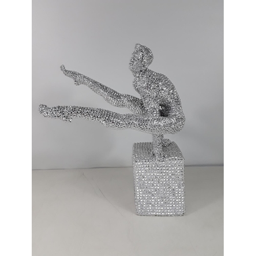 7 - Modern design figure of a gymnast approx 16 inches