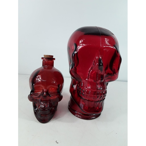 58 - 2 Glass skulls