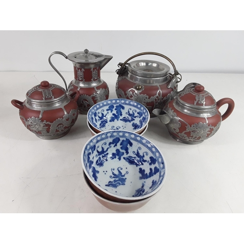 22 - 4 piece oriental overlaid teaset, 4 oriental bowls, 2 pieces of Ainsley and a cake plate