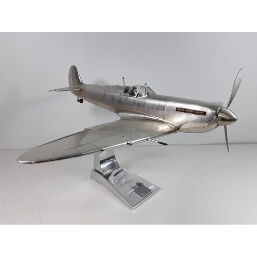 57 - Large AM (authentic models) Spitfire on stand with signed plaque approx 60cms by 77cms by 38cms