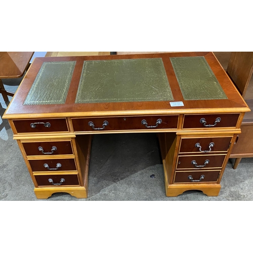 184 - YEW WOOD PEDISTAL DESK WITH GREEN LEATHER TOP