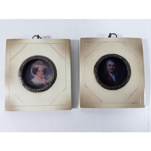 152 - Pair of square white framed miniatures