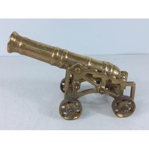 195 - Brass canon 22cms in length