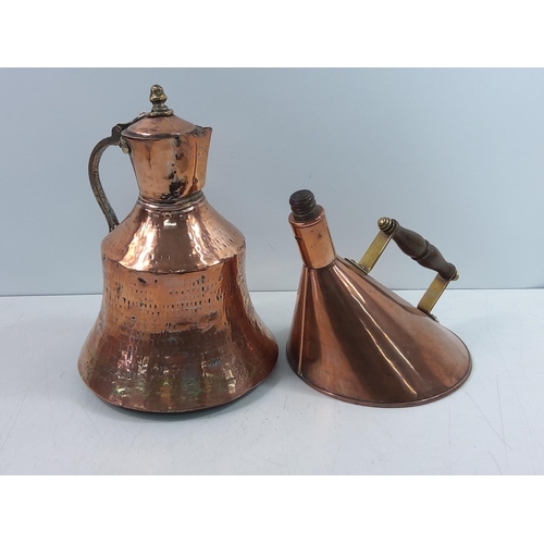 219 - Unusual copper kettle and Eastern copper jug