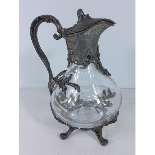 237 - Metal mounted claret jug