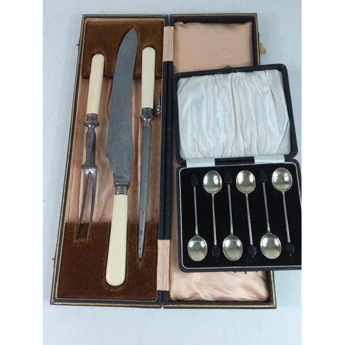 239 - Boxed bean spoons and carving set