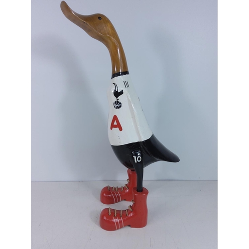 293 - Carved wooden duck in Spurs colours