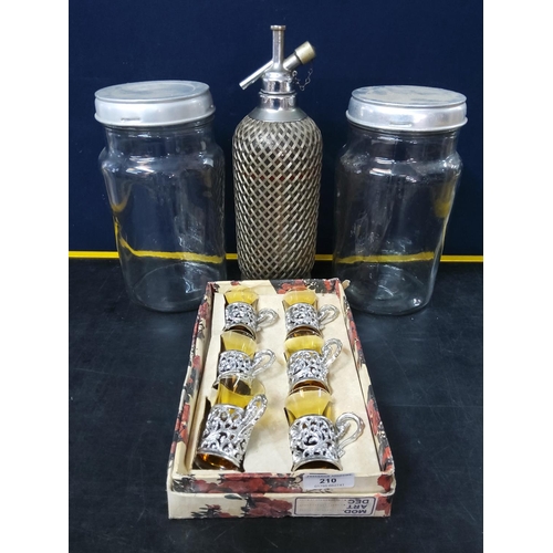 210 - Soda syphon, storage jars and set of glasses