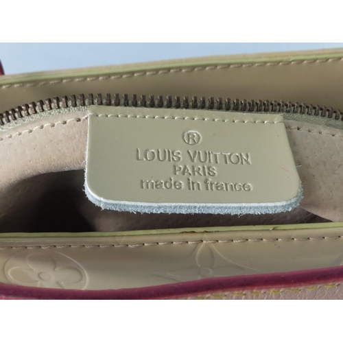 78 - Ladies small handbag marked LV