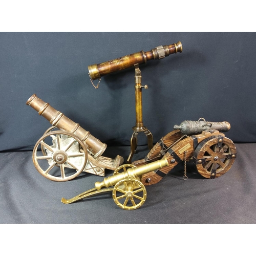 187 - 3 model canons and a telescope on stand