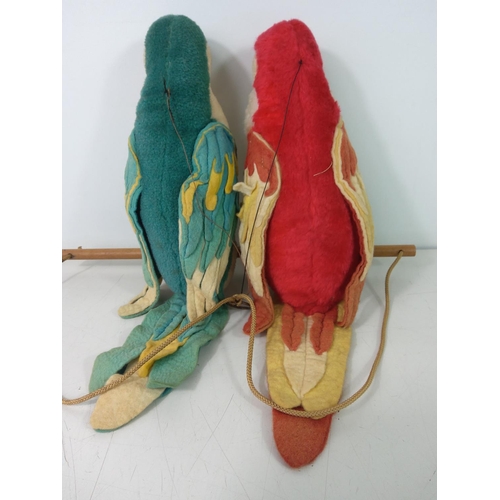 64 - Pair of Merrythought parrots on a perch