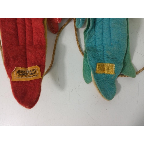 64 - Pair of Merrythought parrots on a perch