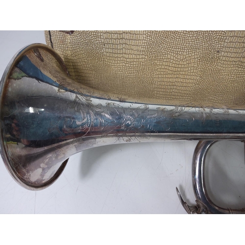 69 - Cased trumpet