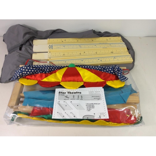 192 - Toy theatre, boots, coats etc