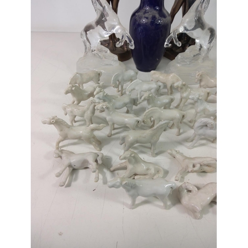 201 - Horse figures, lady figures and a vase