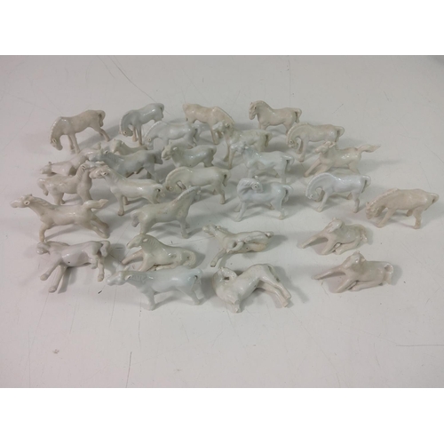 201 - Horse figures, lady figures and a vase