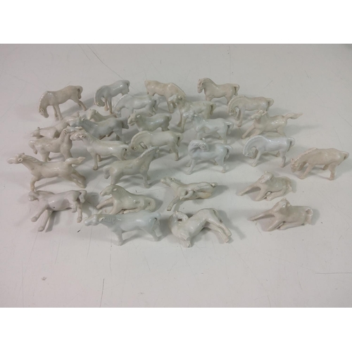 201 - Horse figures, lady figures and a vase